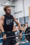  Black vest with Contact Coffee logo on model in gym