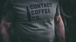  man wearing contact coffee co military green t-shirt