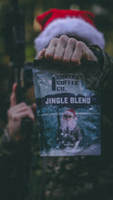 Load image into Gallery viewer, Jingle Blend ground Christmas coffee bag topped with a Santa hat
